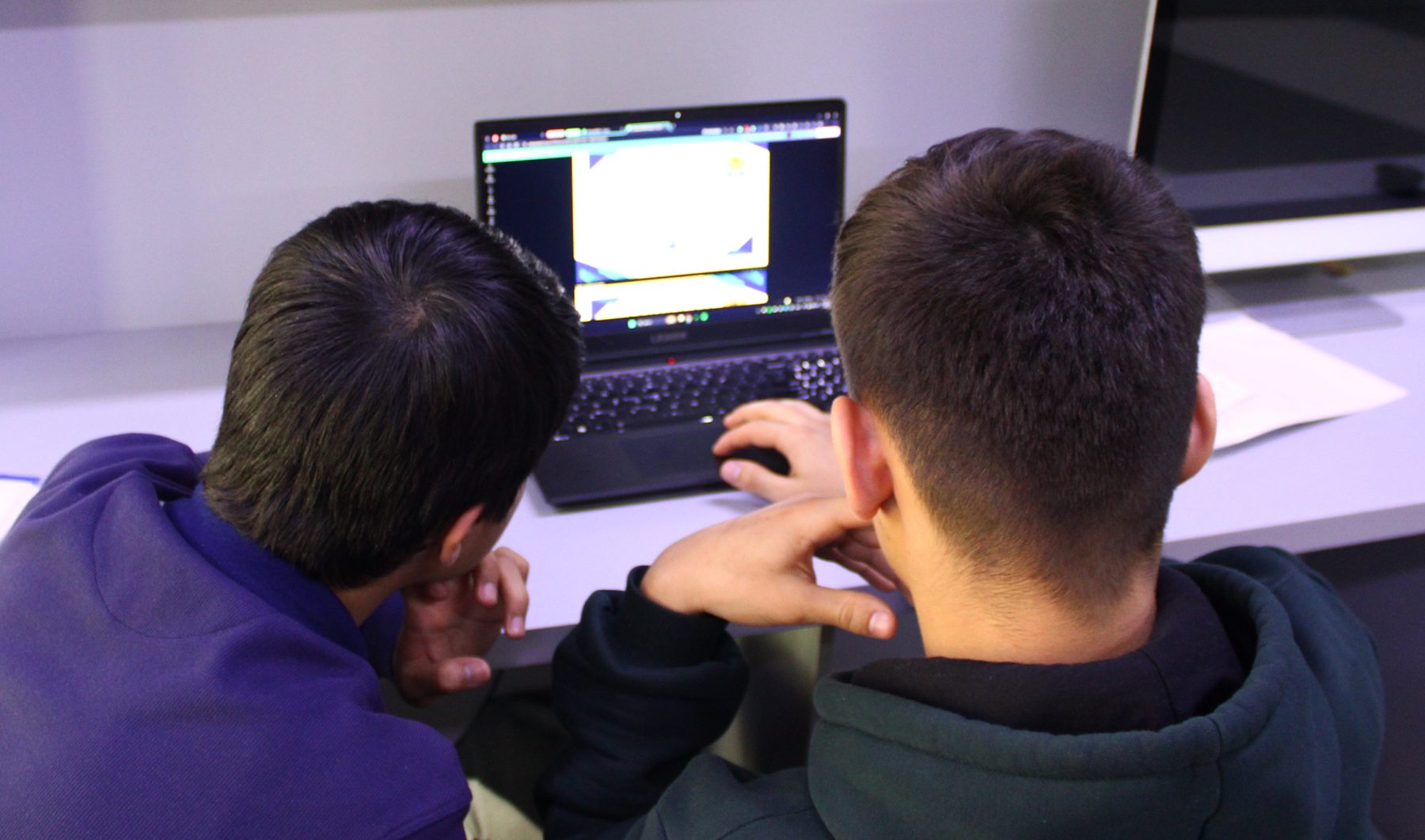 Delegates at work during a session
