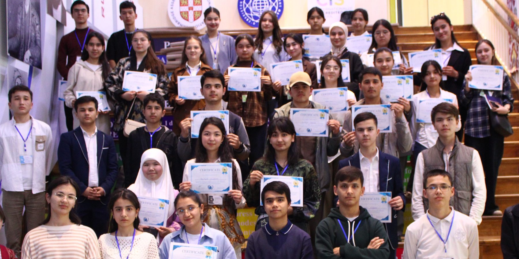 Delegates and chairs with their certificates